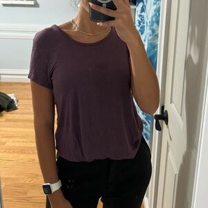 Purple T shirt, open back section